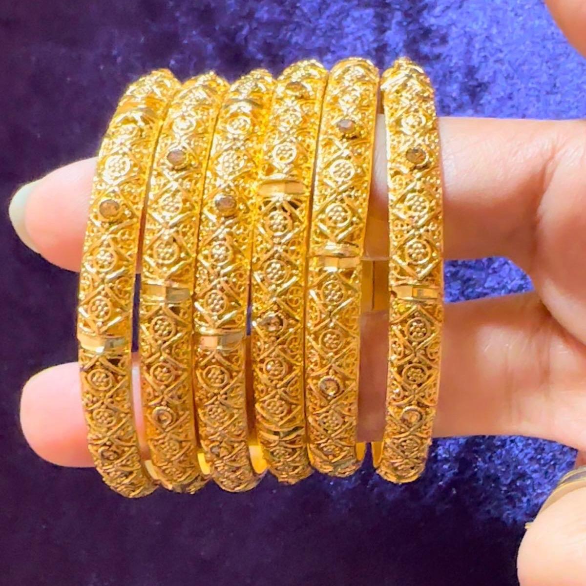 Gold loolike awesome bangles  6 pieces
