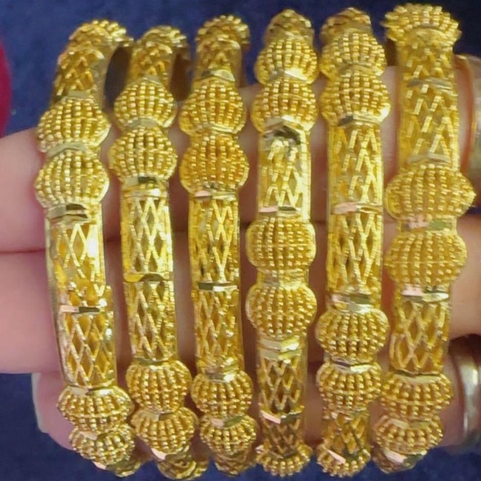 Golden gold look bangles  different design not Goldplated