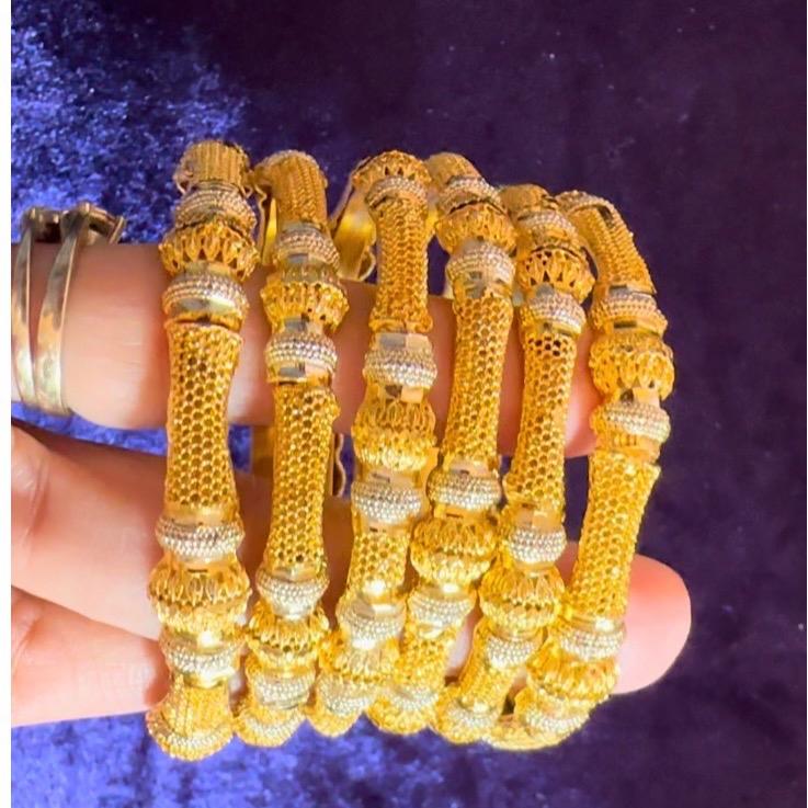 Gold loolike awesome bangles  6 pieces
