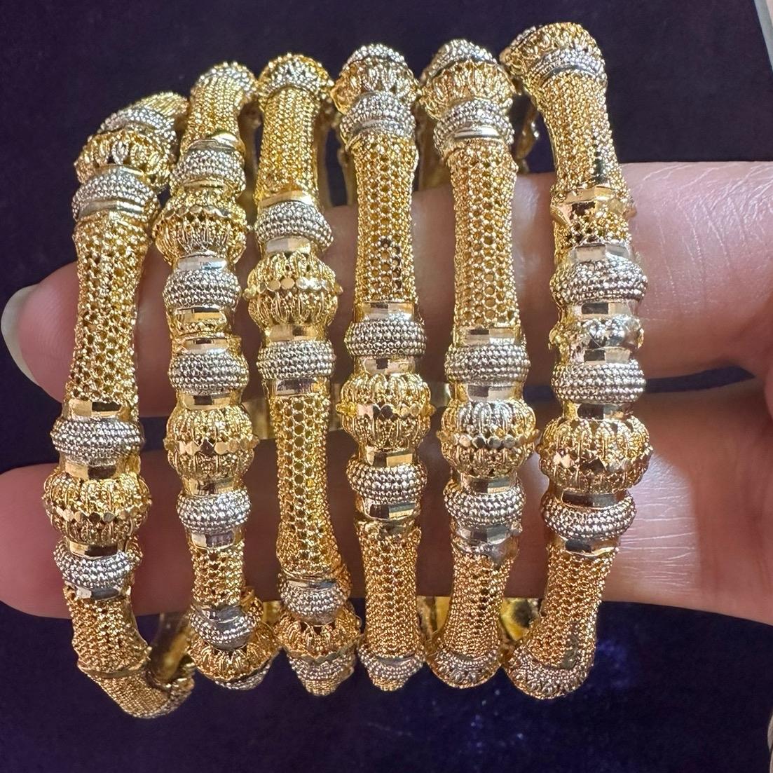 Gold loolike awesome bangles  6 pieces